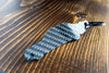 A 190E 2.3 16 valve carbon fiber keychain, rear view