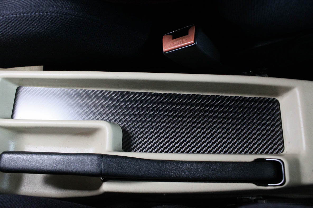 Center console pocket - Carbon fiber trim