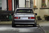 Smoke silver 190E with the STEVS Crown carbon fiber wing extension