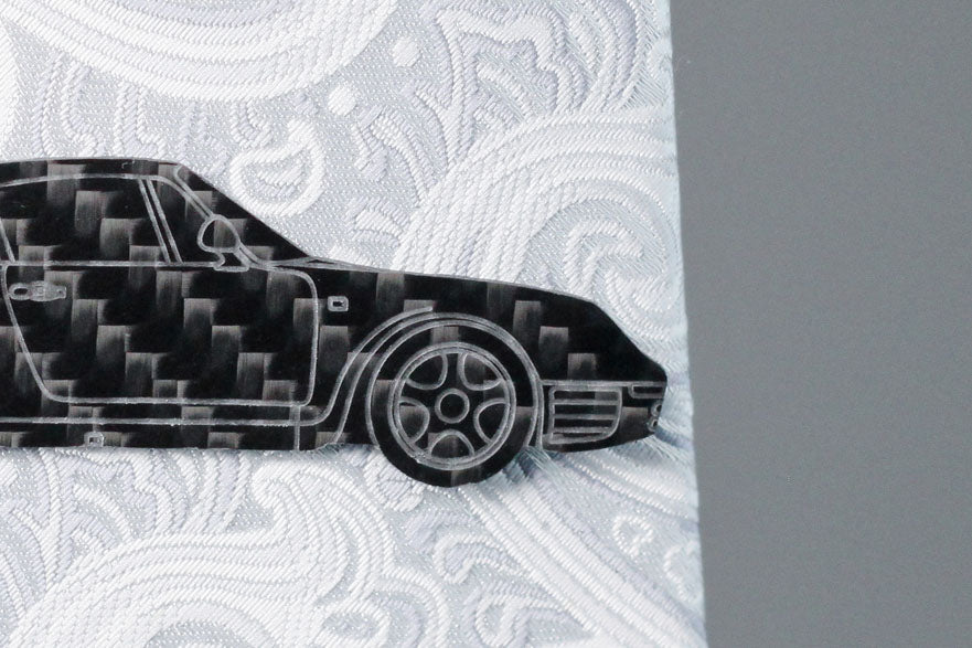 A 959 carbon fiber tie clip, front close up
