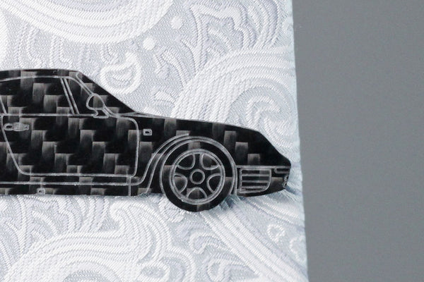A 959 carbon fiber tie clip, front close up