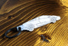 Diablo 6.0 carbon fiber keychain, reflecting light