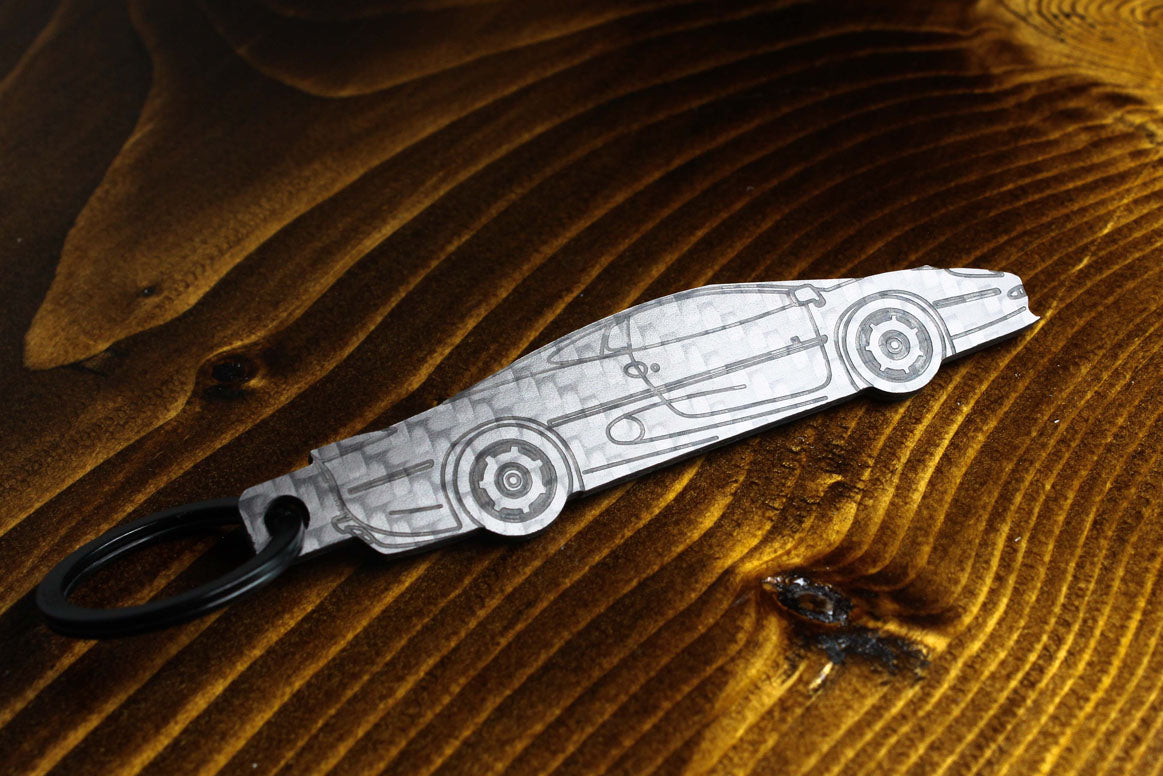 XJ220 carbon fiber keychain, reflecting light