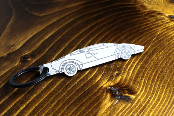 Countach carbon fiber keychain, reflecting light