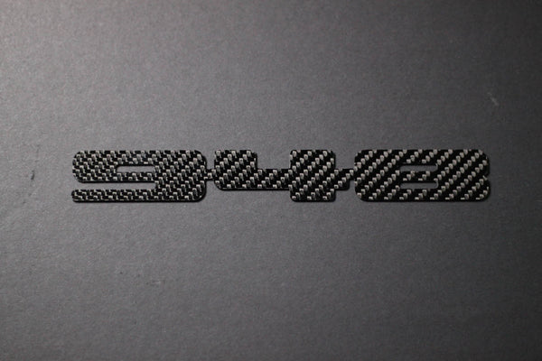Carbon fiber "948" badge