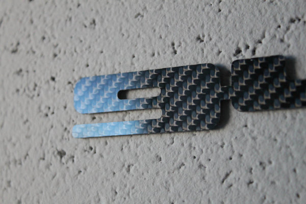 Carbon fiber "948" badge