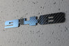 Carbon fiber "948" badge