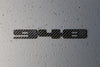 Carbon fiber "948" badge