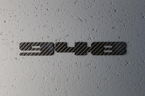 Carbon fiber "948" badge
