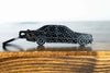 A 190E 2.3 16 valve carbon fiber keychain, front view