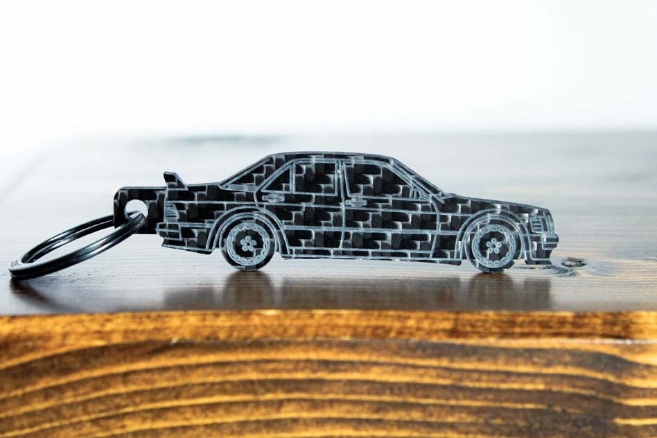 A 190E Evolution 1 carbon fiber keychain, front view