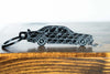 A 190E Evolution 1 carbon fiber keychain, front view