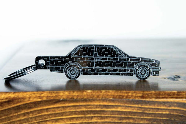 An E30 Coupe carbon fiber keychain, front view