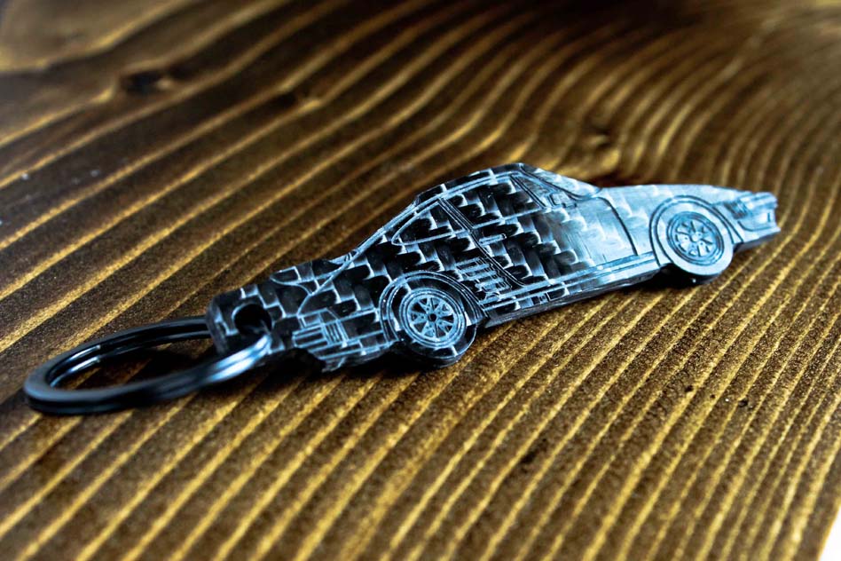 A 911 930 Slantnose carbon fiber keychain, angle view