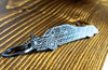 A 190E Evolution 2 carbon fiber keychain, angle view