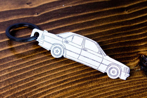 A 190E 2.3 16 valve carbon fiber keychain, line detail view