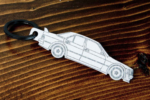 A 190E Evolution 1 carbon fiber keychain, line detail view