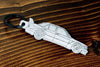 A 190E Evolution 2 carbon fiber keychain, line detail view