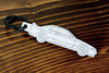 An R32 GTR carbon fiber keychain, line detail view