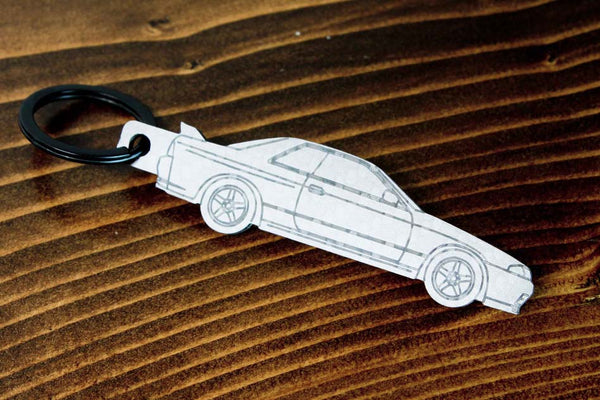 An R32 GTR carbon fiber keychain, line detail view