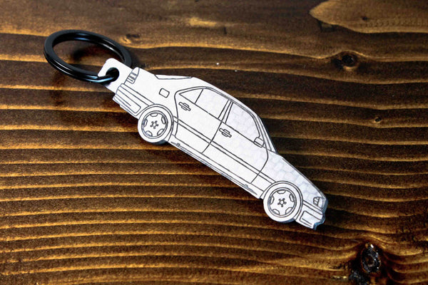 A C36 AMG carbon fiber keychain, line detail view