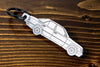 A W124 500E carbon fiber keychain, line detail view