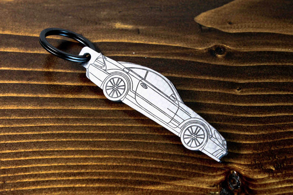 An SL65 Black Series carbon fiber keychain, line detail view