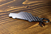 A 242 Turbo Evolution carbon fiber keychain, rear view