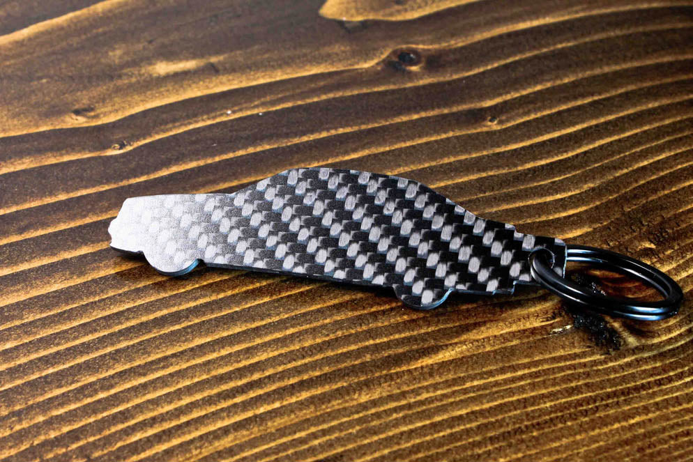 A C36 AMG carbon fiber keychain, rear view
