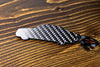 A C36 AMG carbon fiber keychain, rear view
