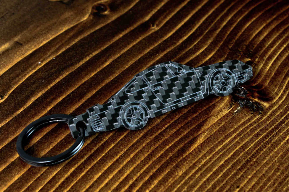 A 959 carbon fiber keychain, angle view