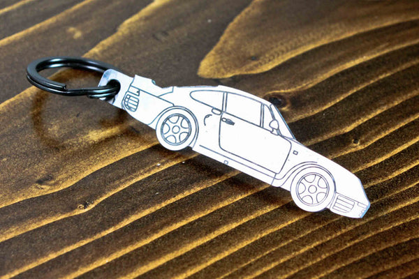 A 959 carbon fiber keychain, line detail view