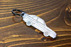 A Sport Quattro carbon fiber keychain, line detail view