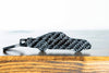 A 959 carbon fiber keychain, front view