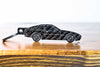 A 944 Turbo carbon fiber keychain, front view