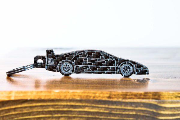 An F40 carbon fiber keychain, front view