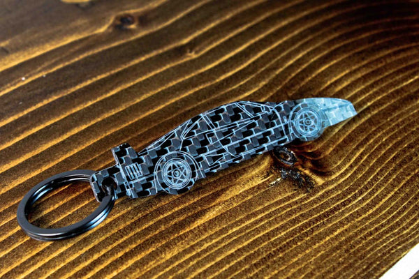An F40 carbon fiber keychain, angle view