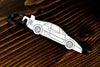 An F40 carbon fiber keychain, line detail view