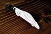 An F1 carbon fiber keychain, line detail view