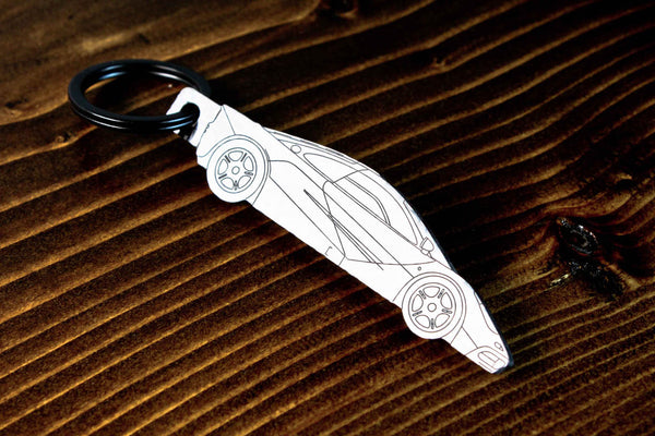 An F1 carbon fiber keychain, line detail view