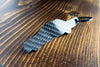 An E30 Coupe carbon fiber keychain, rear view
