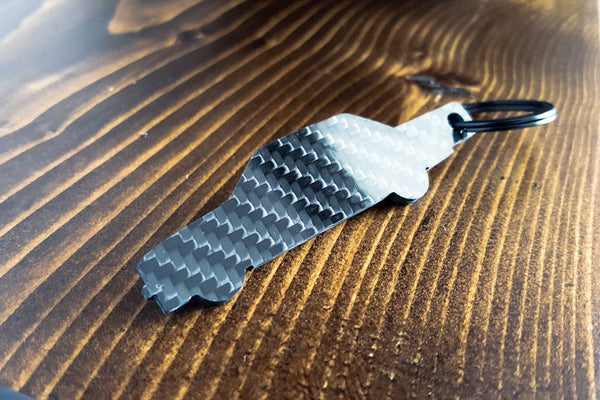 An E30 Coupe carbon fiber keychain, rear view