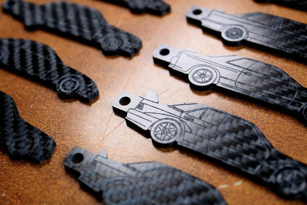 Carbon fiber keychains inspired by super cars. Made in Vaughan Ontario and shipped worldwide. 