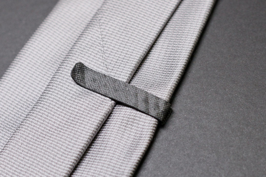 Countach carbon fiber tie clip, back side on tie