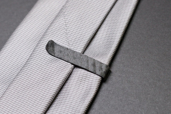 F1 carbon fiber tie clip, back side on tie