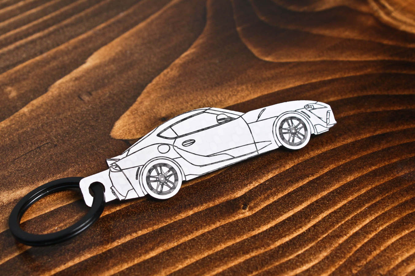 GR Supra carbon fiber keychain reflection