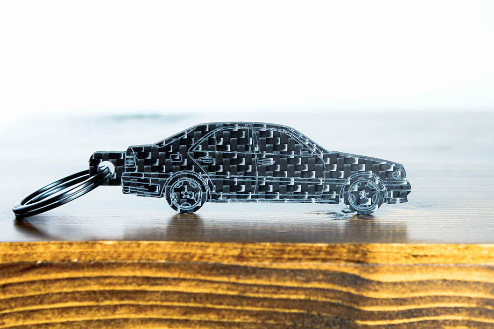 A C36 AMG carbon fiber keychain, front view