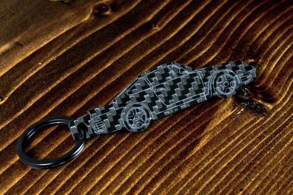 A 959 carbon fiber keychain, angle view
