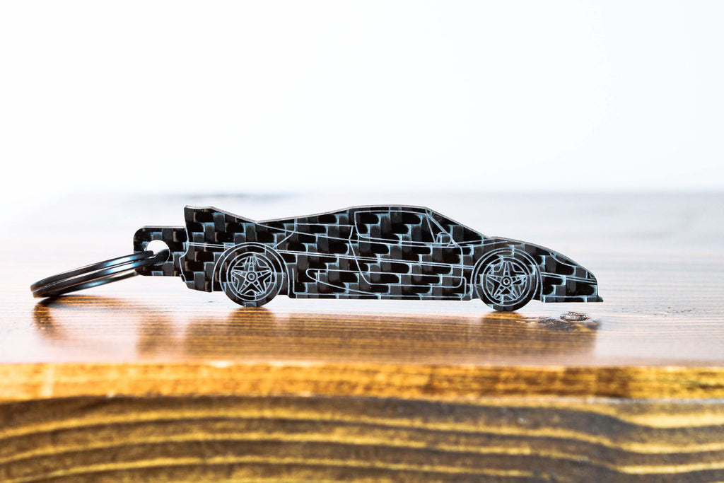 An F50 carbon fiber keychain, front view