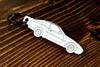 A 944 Turbo carbon fiber keychain, line detail view